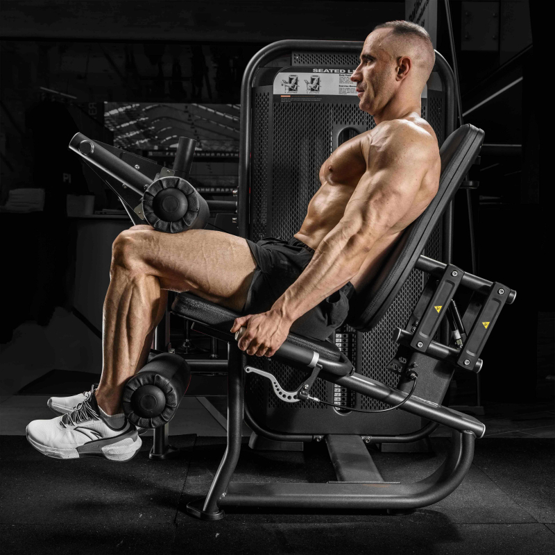 Сгибание ног сидя. Стек E7023 110 кг DHZ Fitness